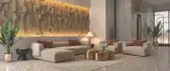 Grand arrival lobby at Gulnaar Zenium featuring plush seating, modern finishes, ambient lighting and sculpted wall art