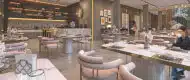 Gulnaar Zenium clubhouse dining lounge with modern seating, designer tables, ambient lighting and residents enjoying meals