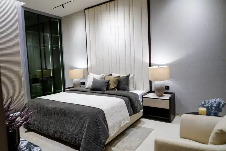 Gulnaar Zenium luxury bedroom rendering featuring king-size bed, vertical upholstered headboard, bedside tables and lamps